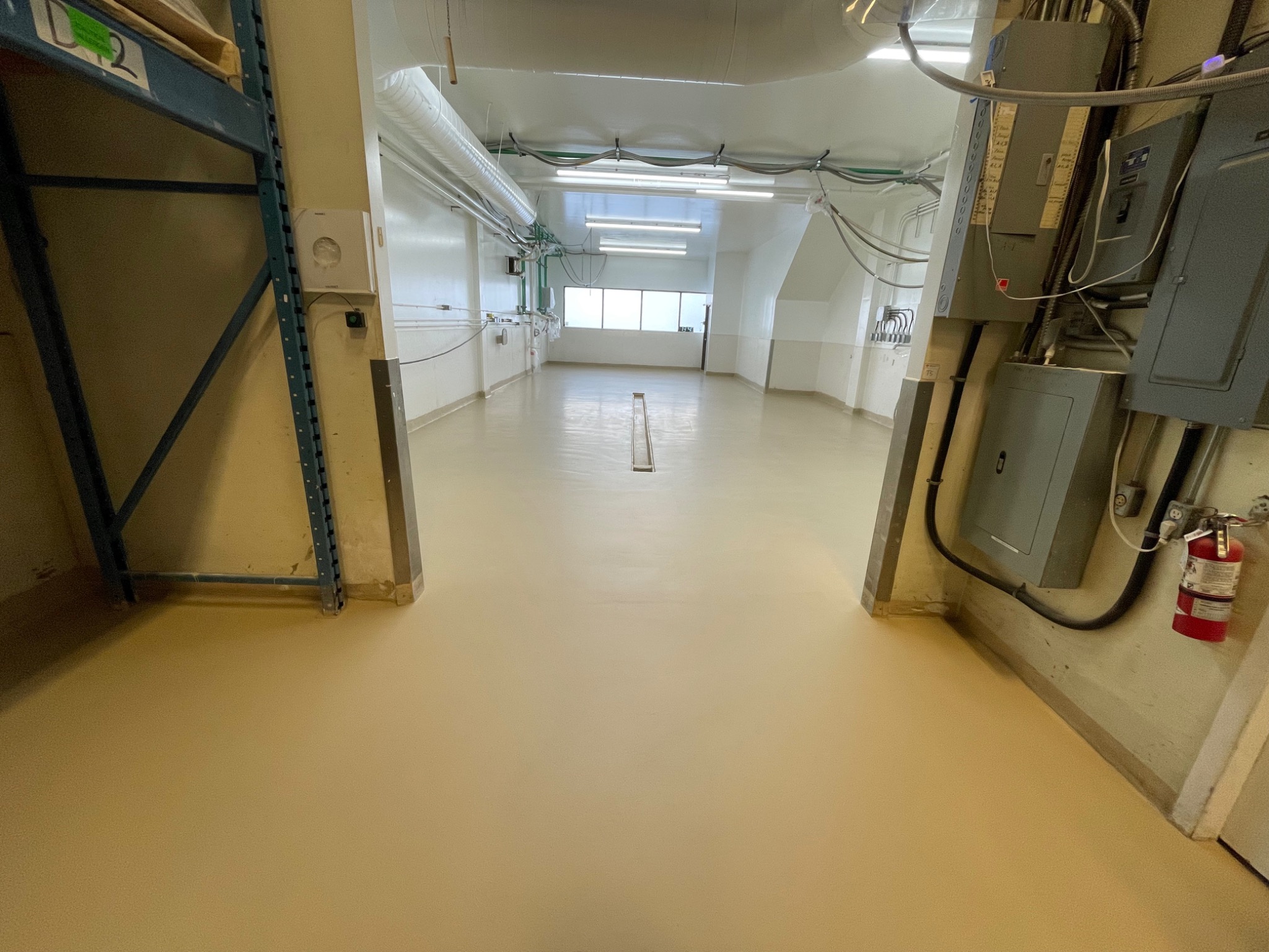 Finished commercial epoxy flooring installed by Miyagi Construction