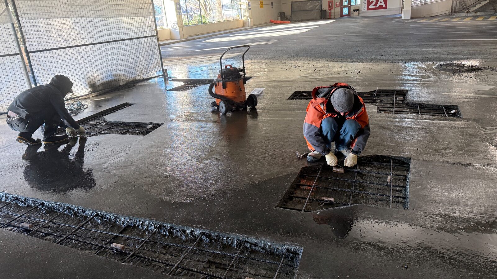 Concrete restoration work in an active healthcare parkade